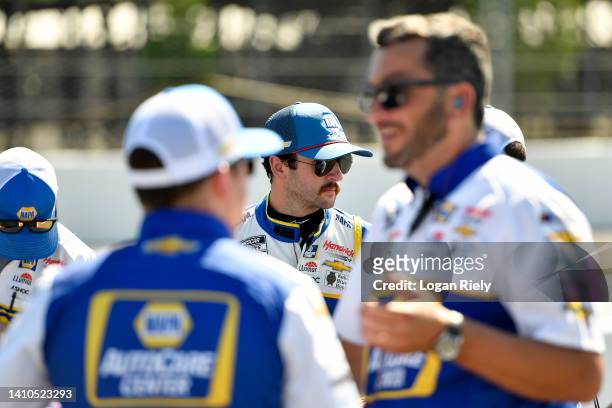 Chase Elliott, driver of the NAPA Auto Parts Chevrolet, works with his crew during qualifying for the NASCAR Cup Series M&M's Fan Appreciation 400 at...