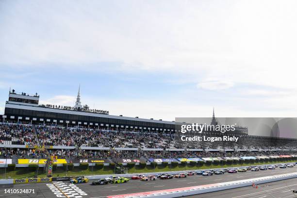 Justin Allgaier, driver of the Hellmann's Chevrolet, leads the field to the green flag to start the NASCAR Camping World Truck Series CRC Brakleen...