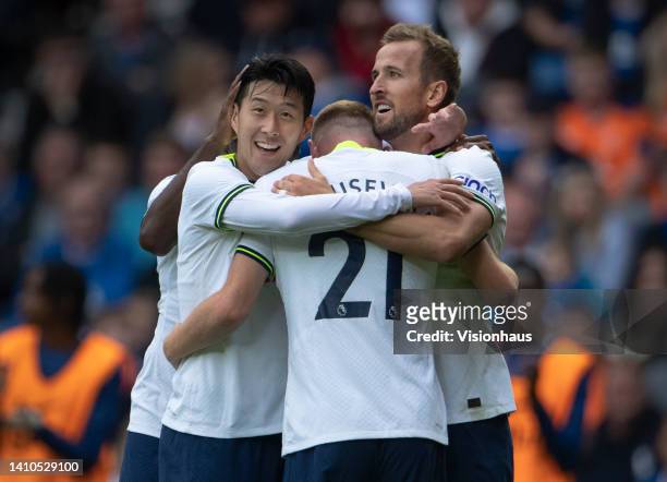 Harry Kane of Tottenham Hotspur celebrates scoring with team mates Dejan Kulusevski and Heung Min Son during the Pre-Season Friendly between Rangers...