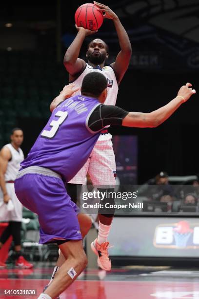 Jeremy Pargo of the Triplets shoots over Chris Johnson of the Ghost Ballers during BIG3 Week Six at Comerica Center on July 23, 2022 in Frisco, Texas.