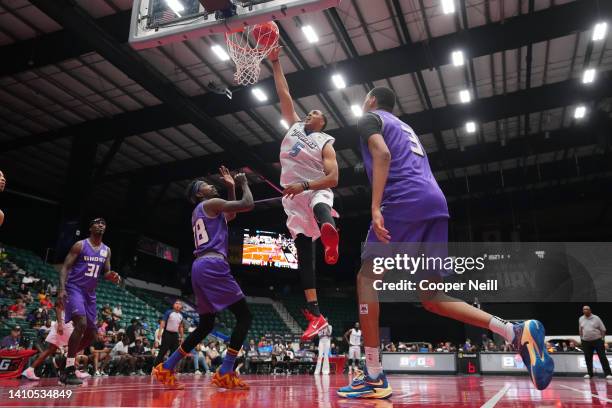 Ryan Hollins of the Triplets dunks against the Ghost Ballers during BIG3 Week Six at Comerica Center on July 23, 2022 in Frisco, Texas.