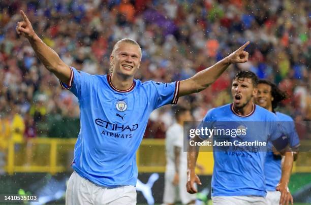 Erling Haaland of Manchester City celebrates after scoring their team's first goal during the pre-season friendly match between Bayern Munich and...