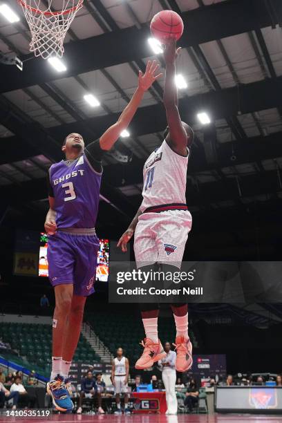 Jeremy Pargo of the Triplets attempts the layup against Chris Johnson of the Ghost Ballers during BIG3 Week Six at Comerica Center on July 23, 2022...