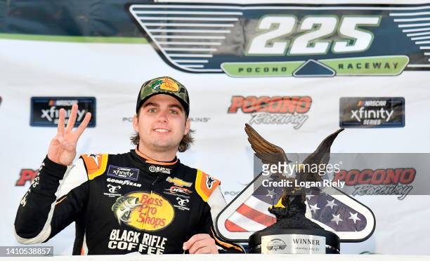 Noah Gragson, driver of the Bass Pro Shops/TrueTimber/BRCC Chevrolet, celebrates in victory lane after winning the NASCAR Xfinity Series Explore the...