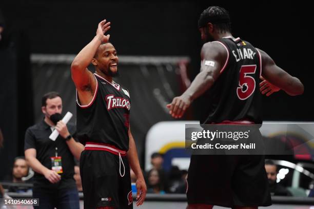 Isaiah Briscoe celebrates with Earl Clark of the Trilogy against the Enemies during BIG3 Week Six at Comerica Center on July 23, 2022 in Frisco,...