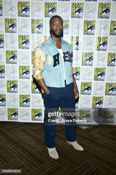 Aldis Hodge attends the 2022 Comic-Con International: San Diego - Warner Bros. "Black Adam" press line at Hilton Bayfront on July 23, 2022 in San...