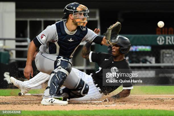 Tim Anderson of the Chicago White Sox slides home to score in the fifth inning against Luke Maile of the Cleveland Guardians during game two of a...