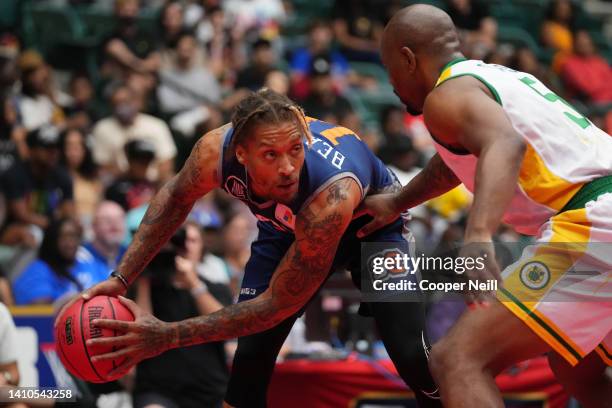 Michael Beasley of 3's Company stares down Stacy Davis of the Ball Hogs during BIG3 Week Six at Comerica Center on July 23, 2022 in Frisco, Texas.