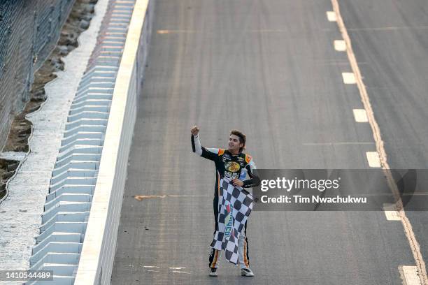 Noah Gragson, driver of the Bass Pro Shops/TrueTimber/BRCC Chevrolet, celebrates with the checkered flag after winning the NASCAR Xfinity Series...