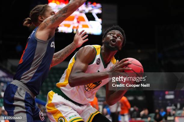 Michael Beasley of 3's Company defends against Kuran Iverson of the Ball Hogs during BIG3 Week Six at Comerica Center on July 23, 2022 in Frisco,...
