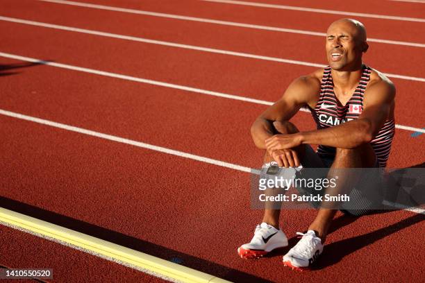 Damian Warner of Team Canada reacts after dropping out of the Men's Decathlon 400m on day nine of the World Athletics Championships Oregon22 at...