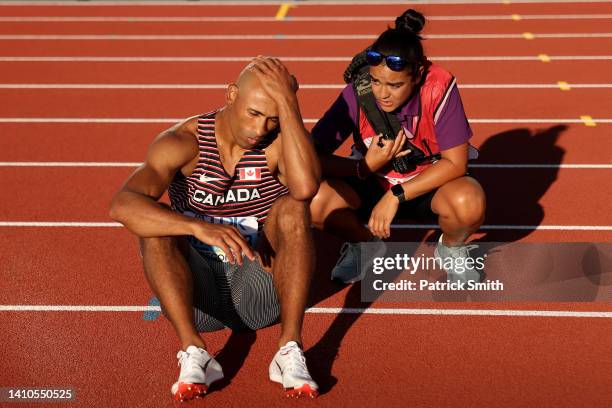 Damian Warner of Team Canada reacts after dropping out of the Men's Decathlon 400m on day nine of the World Athletics Championships Oregon22 at...