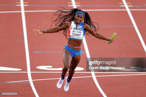 Twanisha Terry of Team United States crosses the finish line to win gold in the Women's 4x100m Relay Final on day nine of the World Athletics...