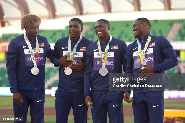 Silver medalists Noah Lyles, Marvin Bracy, Christian Coleman and Elijah Hall of Team United States pose during the medal ceremony for the Men's...