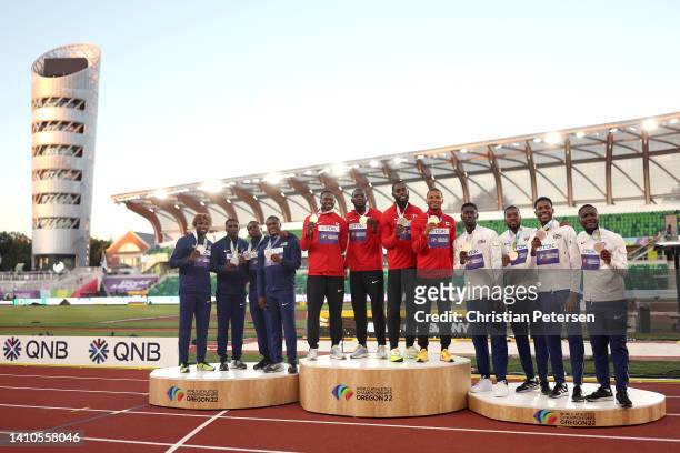 Silver medalists Noah Lyles, Marvin Bracy, Elijah Hall, and Christian Coleman of Team United States, gold medalists Aaron Brown, Jerome Blake,...
