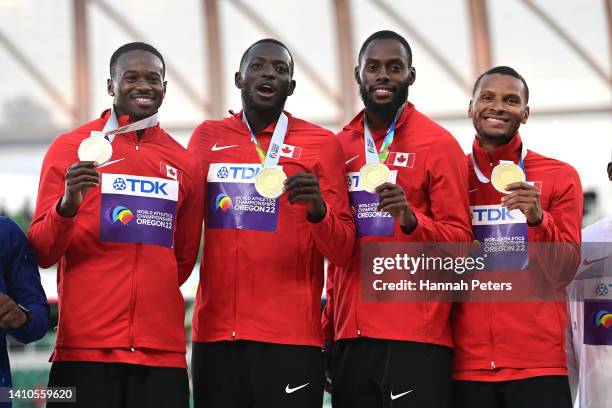 Gold medalists Aaron Brown, Jerome Blake, Brendon Rodney and Andre De Grasse of Team Canada pose during the medal ceremony for the Men's 4x100m Relay...