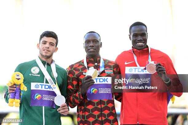 Silver medalist Djamel Sedjati of Team Algeria, gold medalist Emmanuel Kipkurui Korir of Team Kenya, and bronze medalist Marco Arop of Team Canada...
