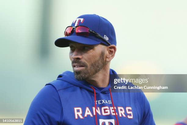 Manager Chris Woodward of the Texas Rangers looks on during the game against the Oakland Athletics at RingCentral Coliseum on July 23, 2022 in...