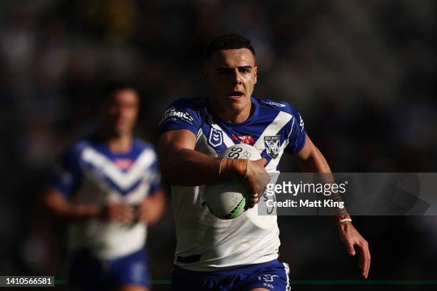 Jason Kiraz of the Bulldogs makes a break during the round 19 NRL match between the Canterbury Bulldogs and the Gold Coast Titans at CommBank...