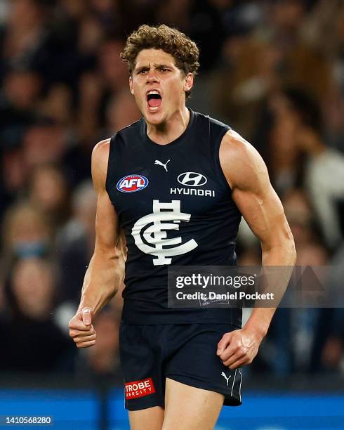 Charlie Curnow of the Blues celebrates kicking a goal during the round 19 AFL match between the Carlton Blues and the Greater Western Sydney Giants...