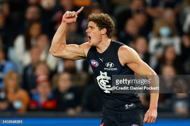 Charlie Curnow of the Blues celebrates kicking a goal during the round 19 AFL match between the Carlton Blues and the Greater Western Sydney Giants...