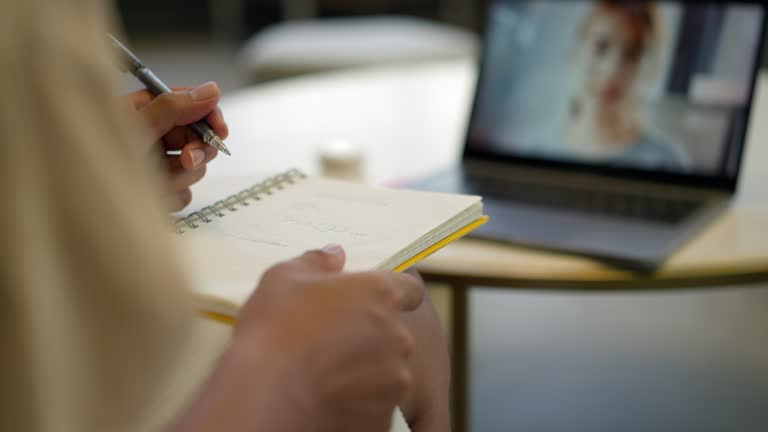 https://media.gettyimages.com/id/1410568357/video/male-students-studying-online-and-taking-notes-from-teaching.jpg?b=1&s=640x640&k=20&c=5IBSiKY9QuSnhCutd4TaxyOb4_N-j1VvdKSlzc6V004=
