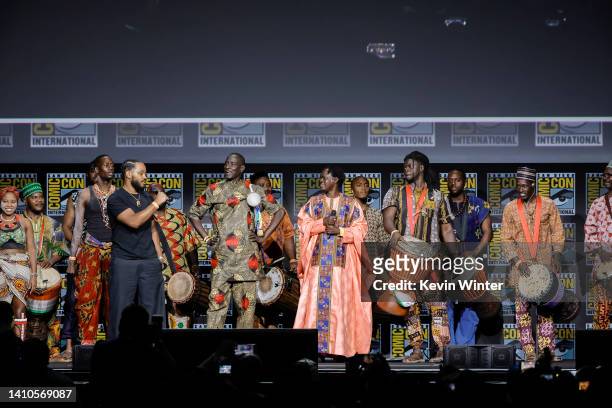 Massamba Diop and Baaba Maal perform onstage at the Marvel Cinematic Universe Mega-Panel during 2022 Comic Con International: San Diego at San Diego...