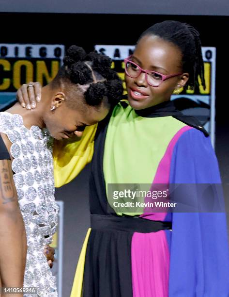 Letitia Wright and Lupita Nyong'o speak onstage at the Marvel Cinematic Universe Mega-Panel during 2022 Comic Con International: San Diego at San...