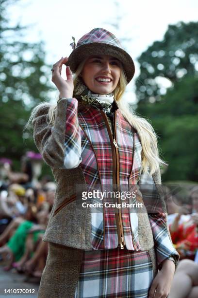 Claudia Todd walks the runway at the Dressed To Kilt Fashion Show and Charity Dinner At Millneck Manor on July 23, 2022 in Mill Neck, New York.