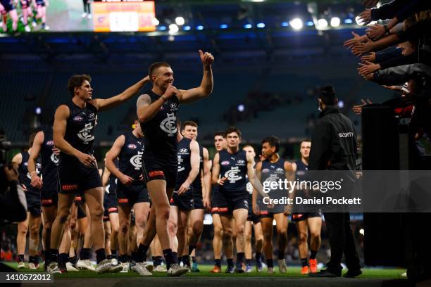 Patrick Cripps of the Blues and Charlie Curnow of the Blues thank fans after winning the round 19 AFL match between the Carlton Blues and the Greater...