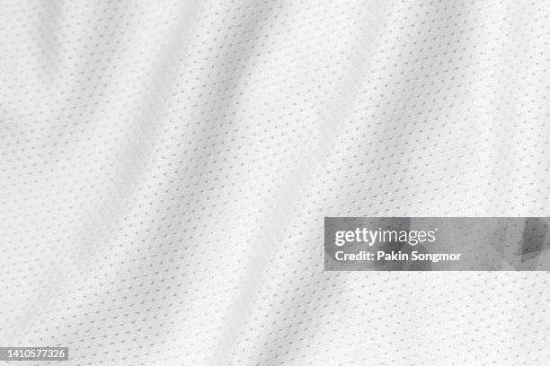 white color sports clothing fabric football shirt jersey texture and textile background. - polyester fotografías e imágenes de stock