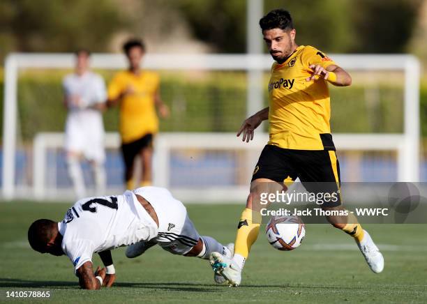 Pedro Neto of Wolverhampton Wanderers is challenged by Valentin News  Photo - Getty Images