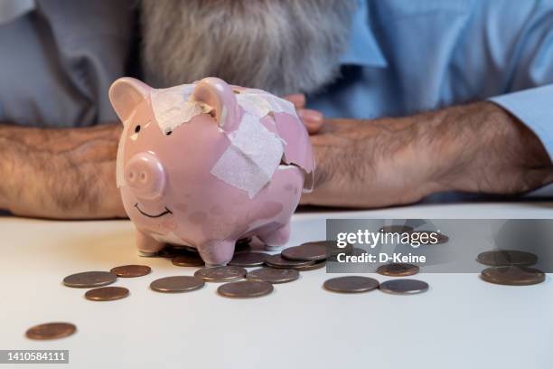 broken piggy bank - smashed piggy bank stock pictures, royalty-free photos & images