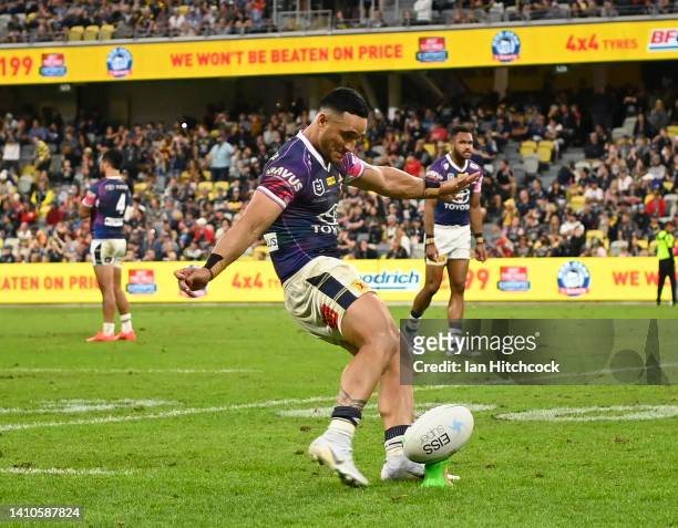 Valentine Holmes of the Cowboys kicks the winning penalty goal during the round 19 NRL match between the North Queensland Cowboys and the Wests...