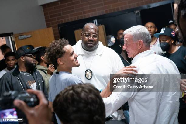 Trae Young and Atlanta Hawks owner Antony Ressler talk after the game during the Drew League Pro-Am at King Drew Magnet High School on July 23, 2022...