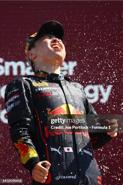 Race winner Ayumu Iwasa of Japan and DAMS celebrates on the podium during the Round 9:Le Castellet Feature race of the Formula 2 Championship at...