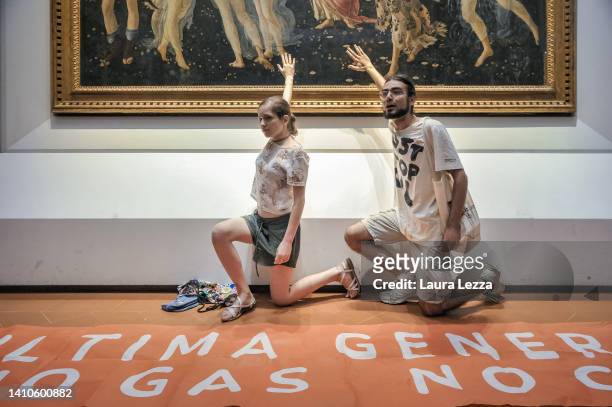 Protesters from the action group Ultima Generazione glue their hands to the glass covering Sandro Botticelli's La Primavera at Uffizi on July 22,...