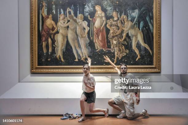 Protesters from the action group Ultima Generazione glue their hands to the glass covering Sandro Botticelli's La Primavera at Uffizi on July 22,...