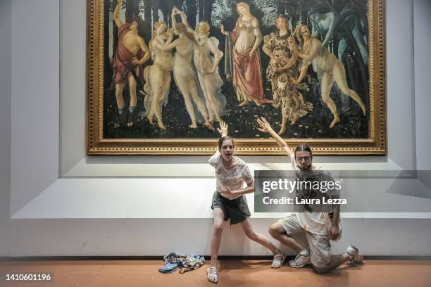 Protesters from the action group Ultima Generazione glue their hands to the glass covering Sandro Botticelli's La Primavera at Uffizi on July 22,...