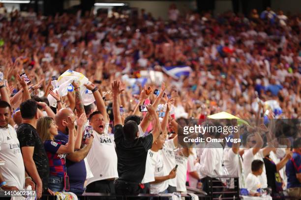 Real Madrid and Barcelona fans do the wave during the preseason friendly match between Real Madrid and Barcelona at Allegiant Stadium on July 23,...
