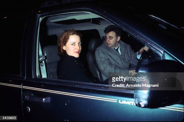 Gillian Anderson rides in a car with a friend March 1, 1998 in New York City. Actress Anderson stars as Special Agent Dana Scully on "The X-Files"...