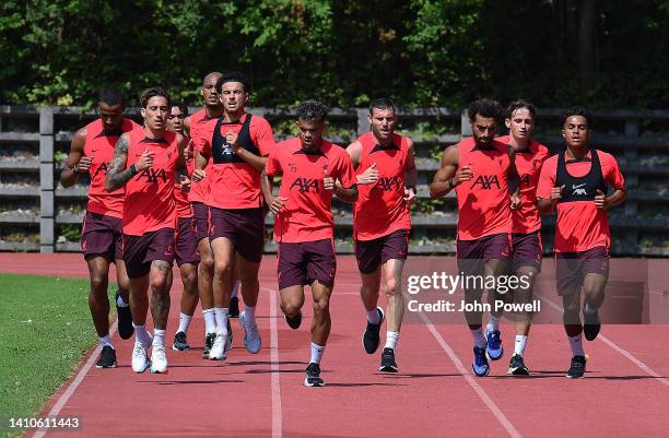 James Milner, Naby Keita, Sepp van den Berg, Curtis Jones, Fabio Carvalho, Tyler Morton and Jordan Henderson captain of Liverpool during the...