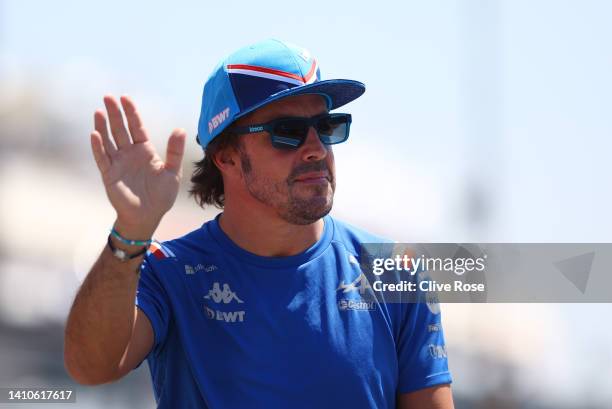 Fernando Alonso of Spain and Alpine F1 waves to the crowd on the drivers parade ahead of the F1 Grand Prix of France at Circuit Paul Ricard on July...