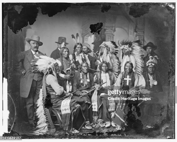 Sioux and Arrapahoe Indian Delegations, between 1865 and 1880. L to R, seated: Red Cloud, Big Road, Yellow Bear, Young Man Afraid of his Horses, Iron...
