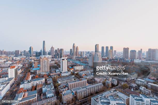 urban architectural landscape in tianjin,china - population explosion stock pictures, royalty-free photos & images