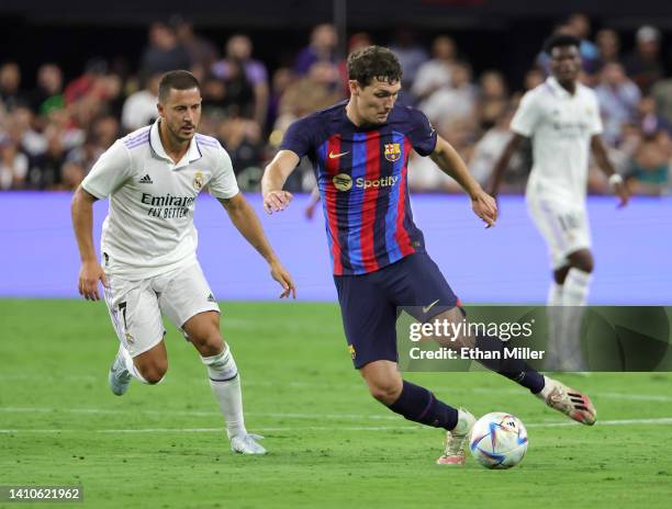 Andreas Christensen of Barcelona dribbles the ball under pressure from Eden Hazard of Real Madrid during their preseason friendly match at Allegiant...