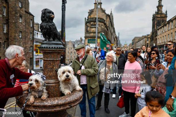 Members of the Dandie Dinmont Terrier Club gather at the statue of Greyfriars Bobby on July 24, 2022 in Edinburgh, Scotland. Mike Macbeth from Canada...