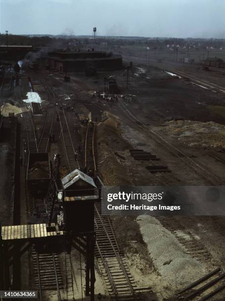 Track repair work at the Bensenville yard of the Chicago, Milwaukee, St. Paul, and Pacific Railroad, Bensenville, Ill. Track repair and work on the...