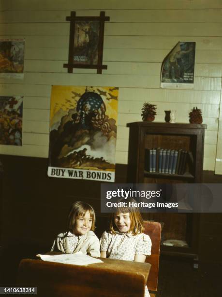 Rural school children, San Augustine County, Texas. [Poster: 'Buy War Bonds']. Artist John Vachon.