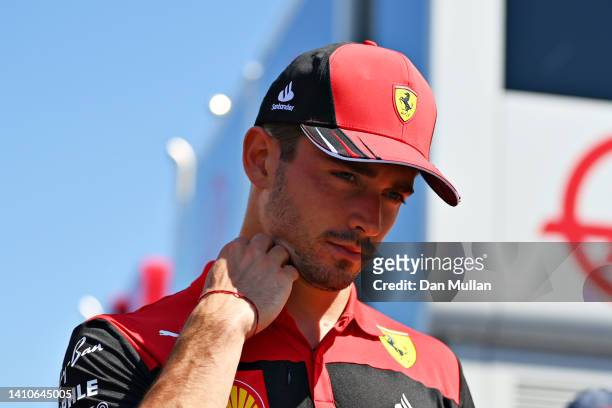 Charles Leclerc of Monaco and Ferrari looks dejected as he walks in the Paddock after retiring from the race during the F1 Grand Prix of France at...